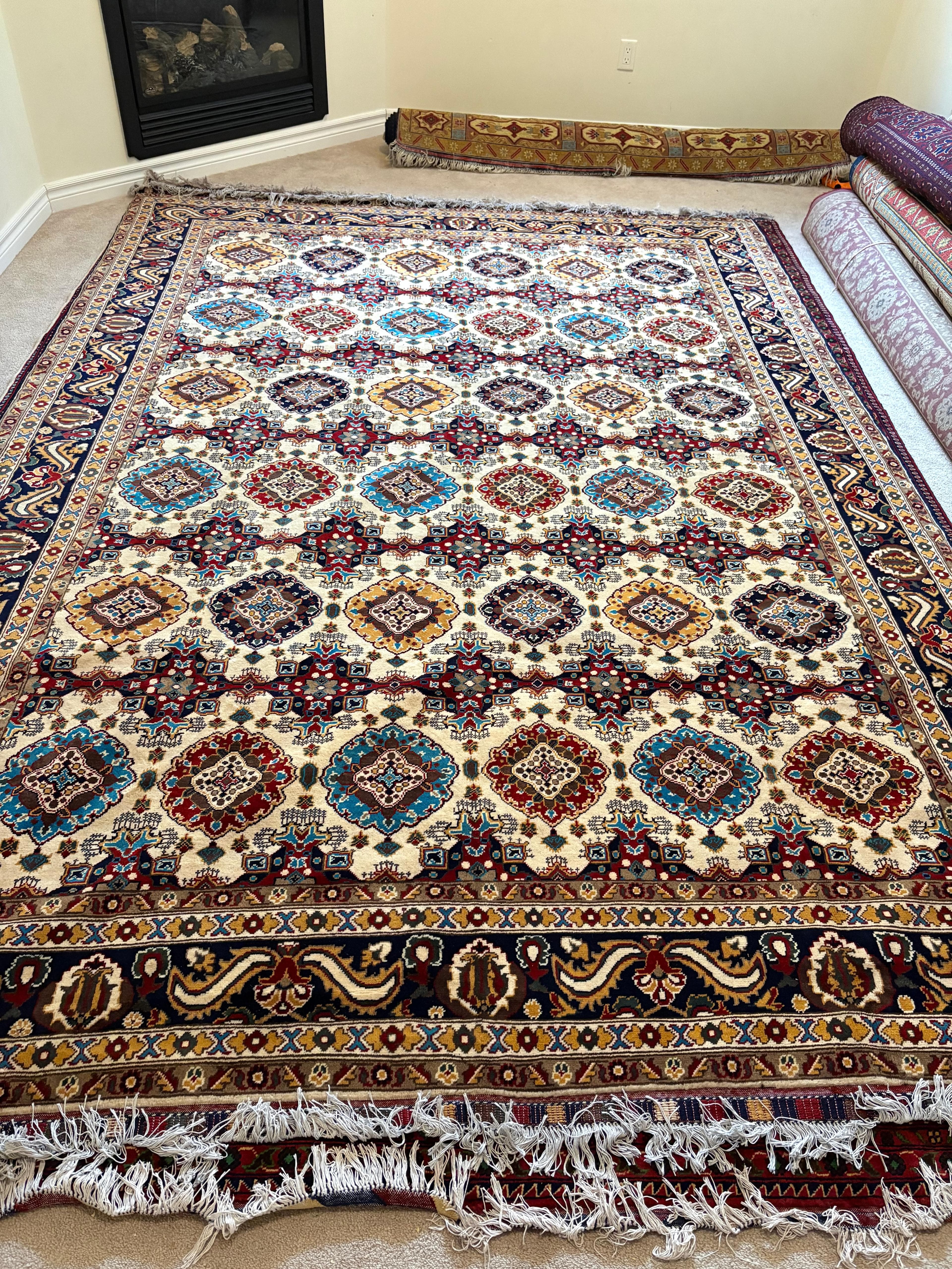 Artisan weaving a carpet